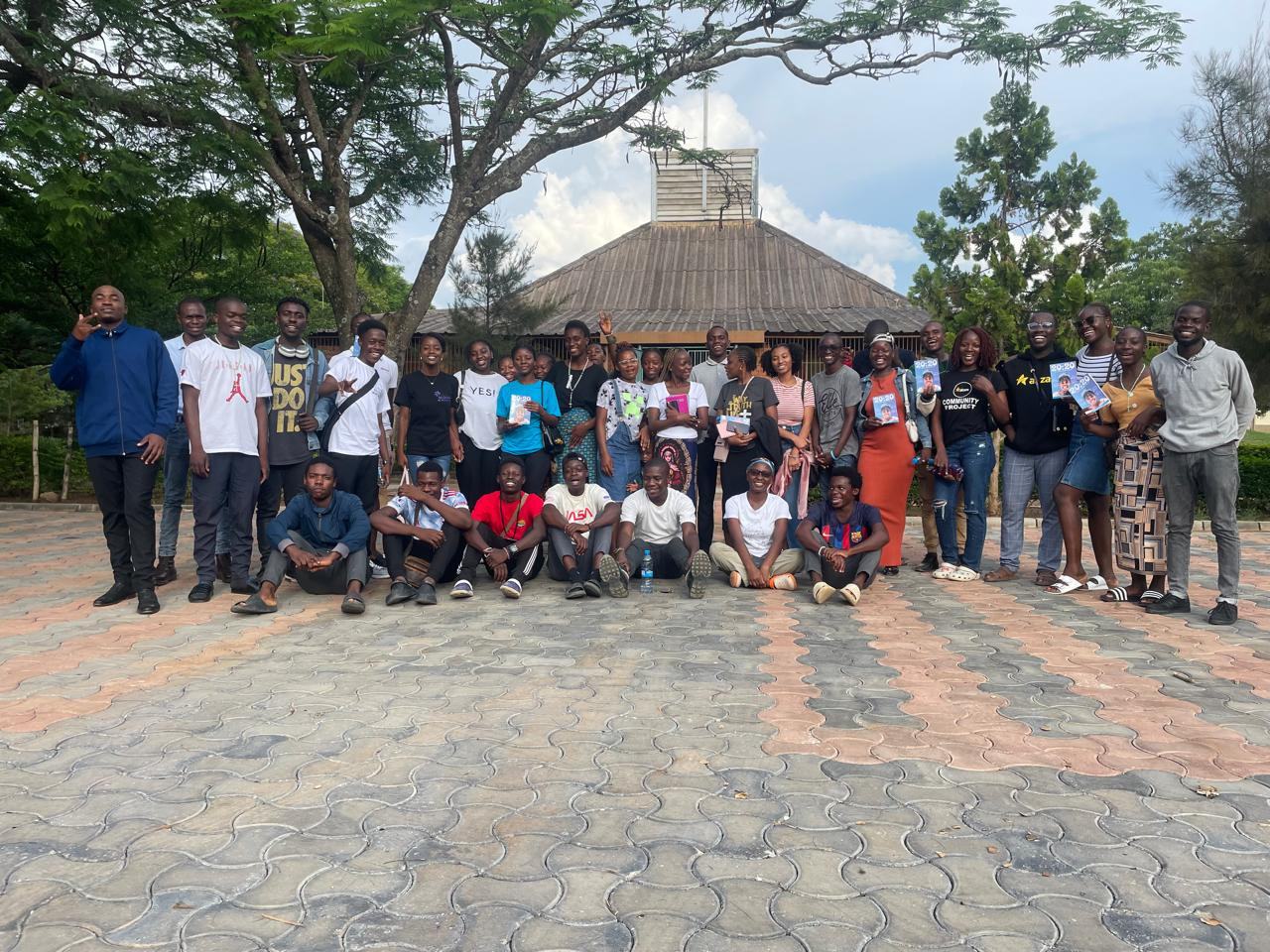 AKZAM Community volunteers and participants gathered outdoors