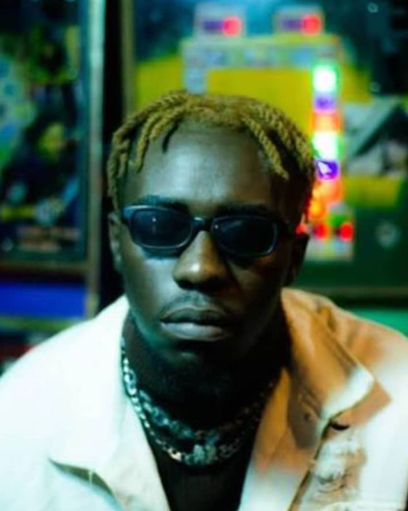 Draco 25, a rapper and singer represented by AKZAM