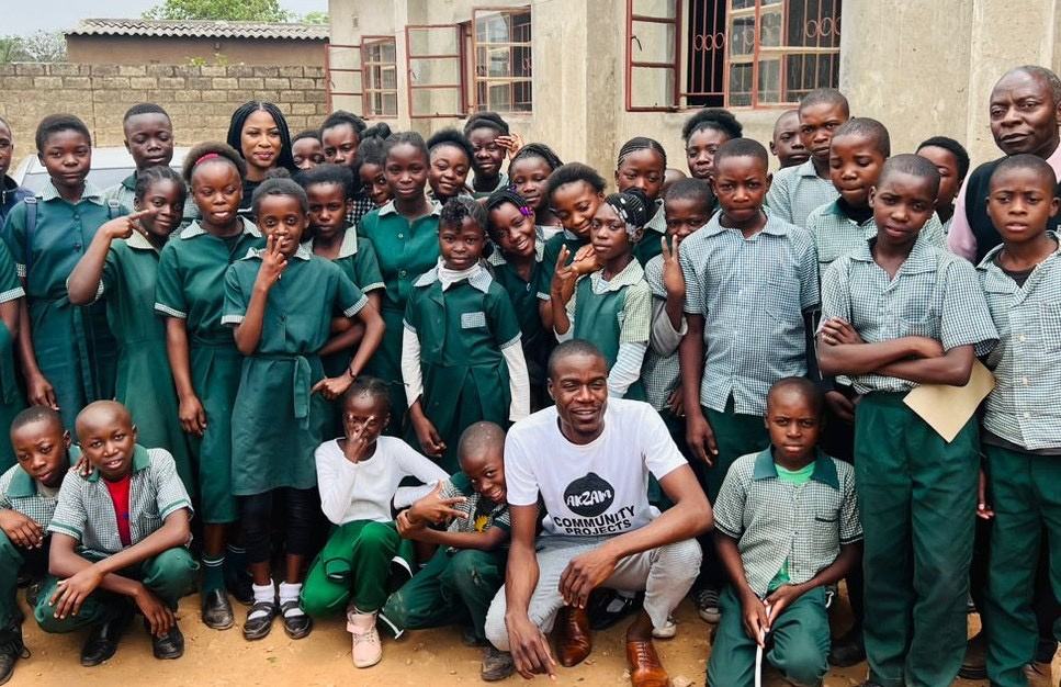 School pupils at an AKZAM book drive