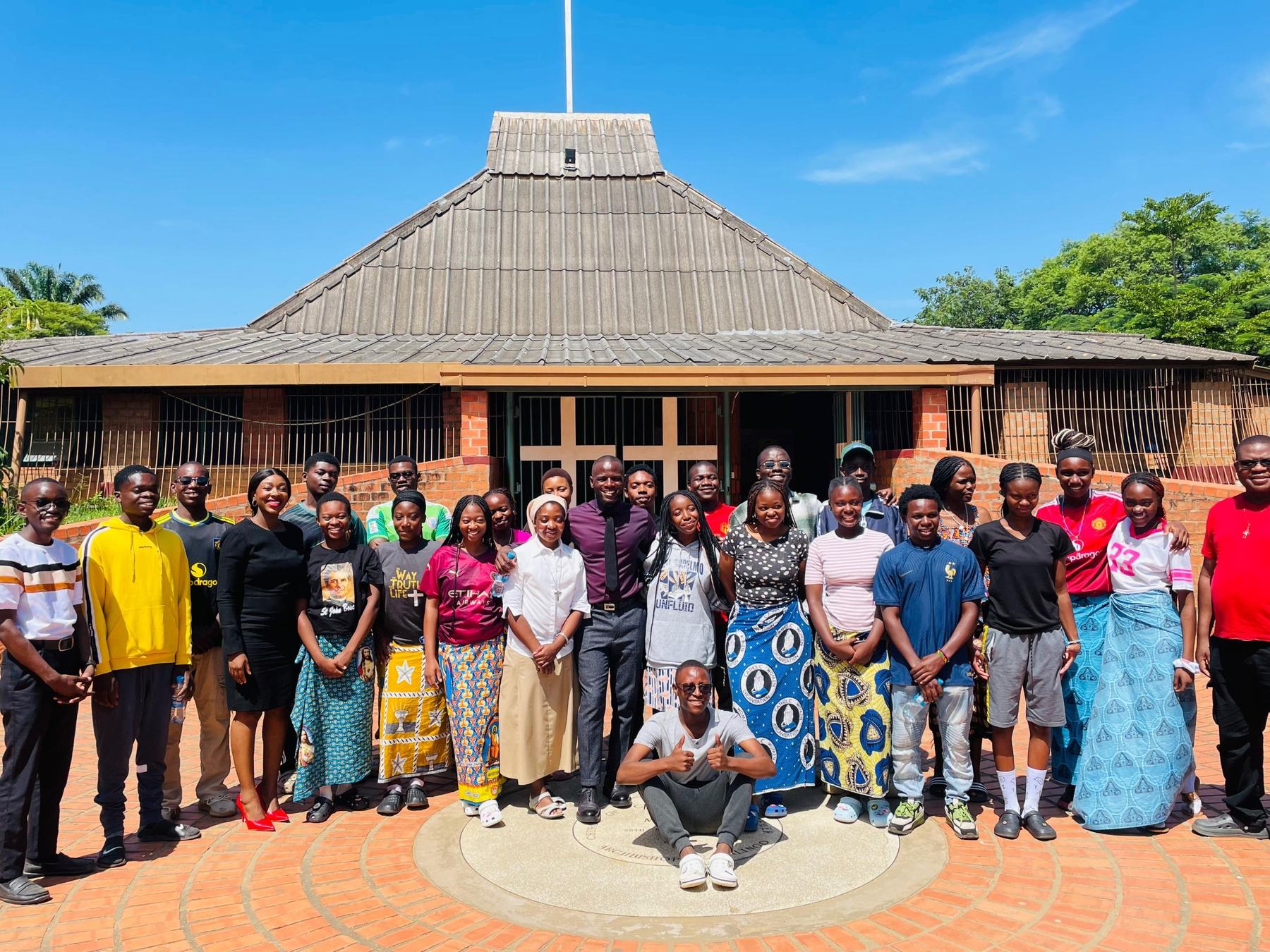 Young people and the AKZAM team gathered outside a church after an AKZAM Youth Talk